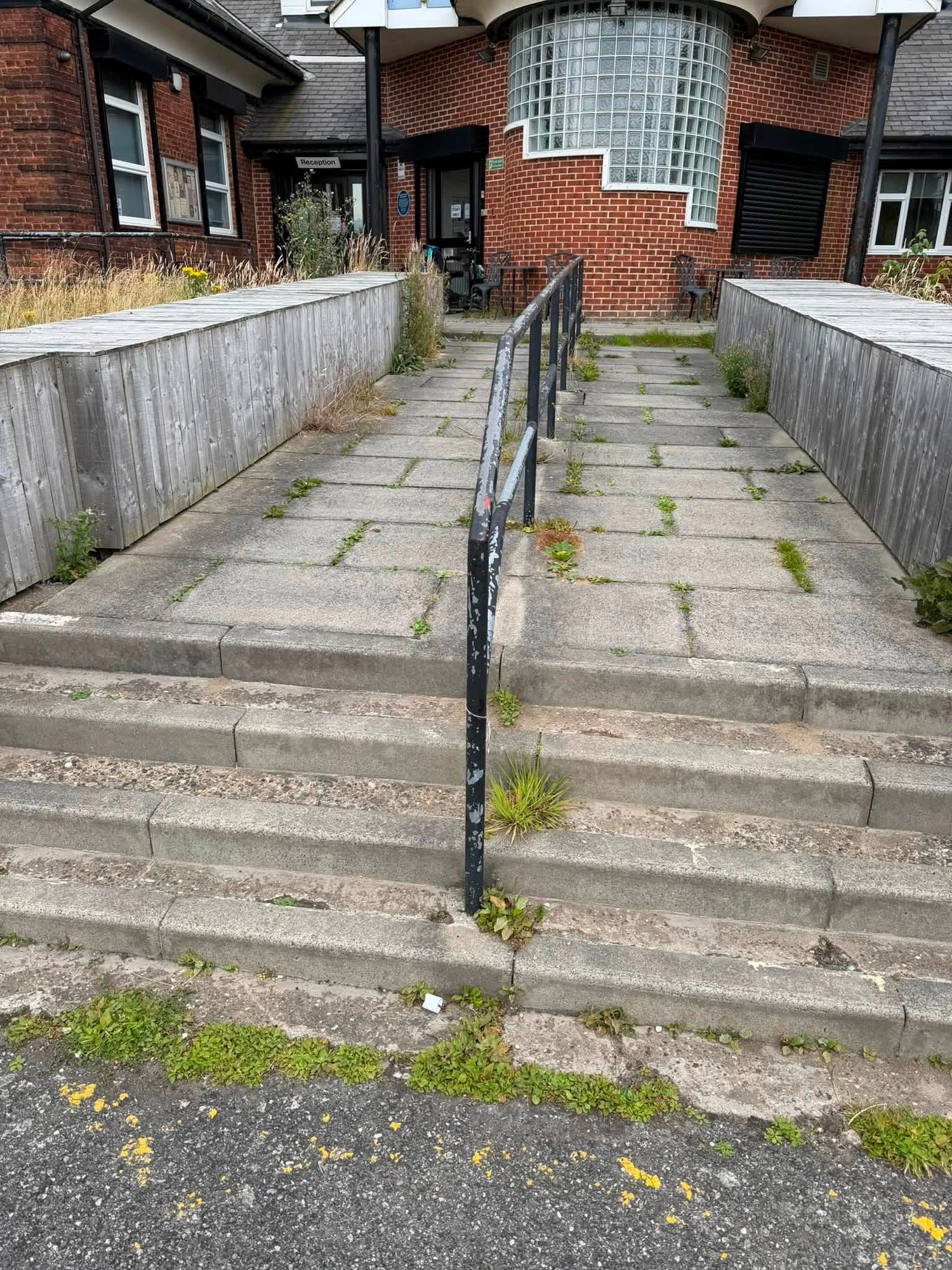 Neglected access ramp restored — care home — before