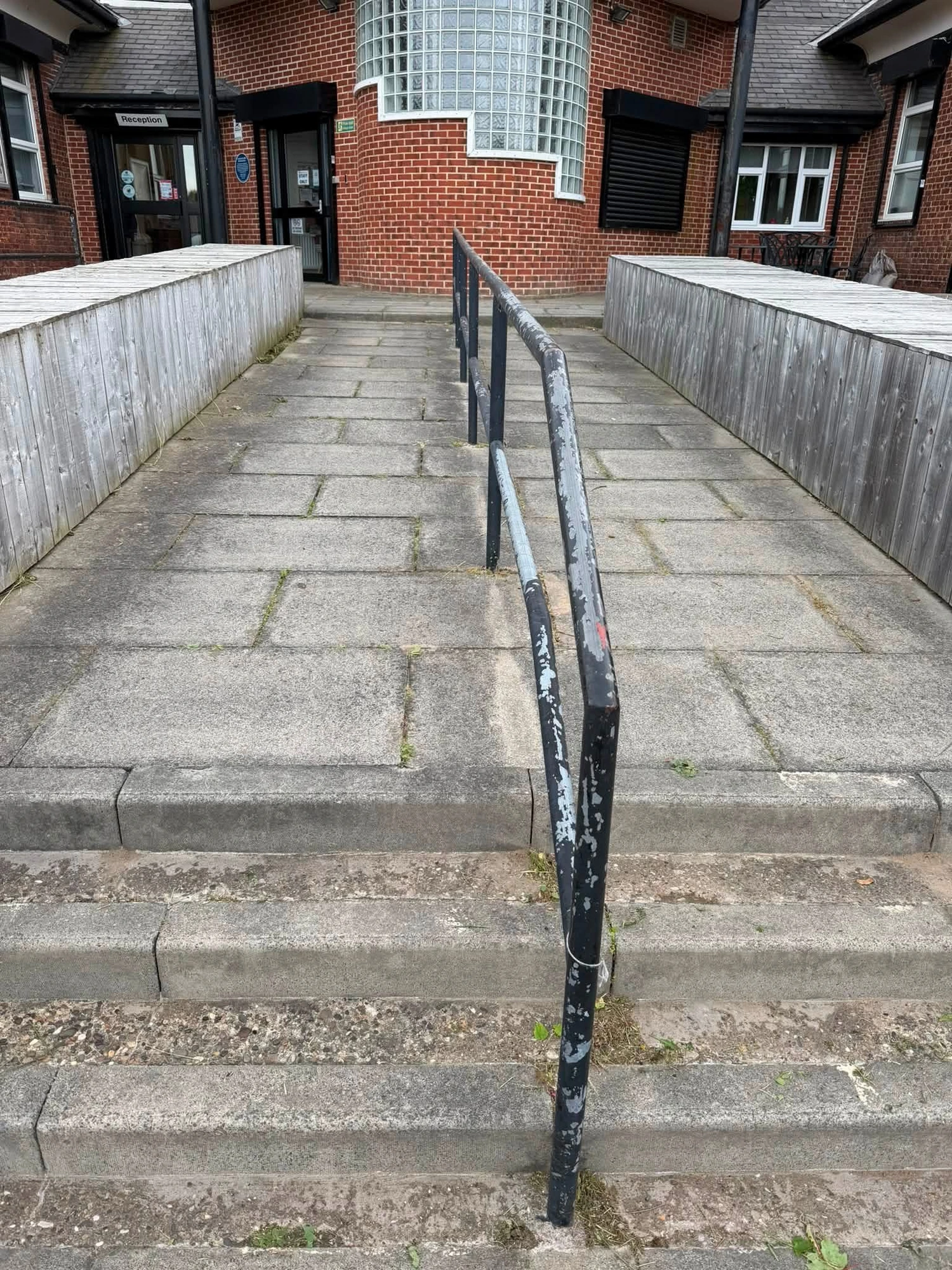 Neglected access ramp restored — care home — after